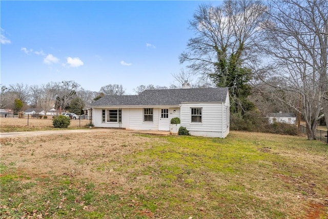 single story home with a front yard