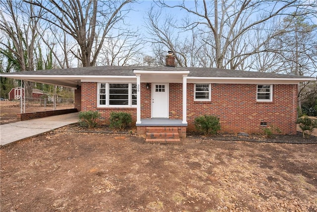 view of front of property with a carport