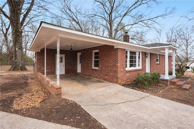 view of front of home featuring a carport