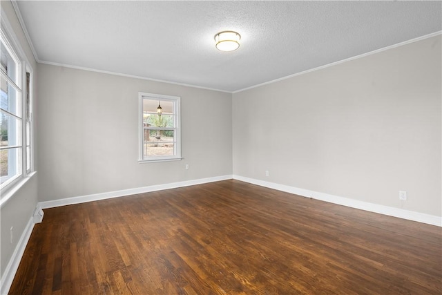 unfurnished room featuring ornamental molding, dark hardwood / wood-style flooring, and a textured ceiling