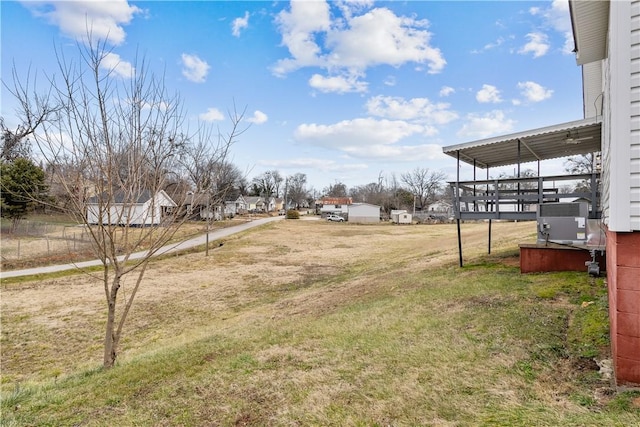 view of yard with central AC