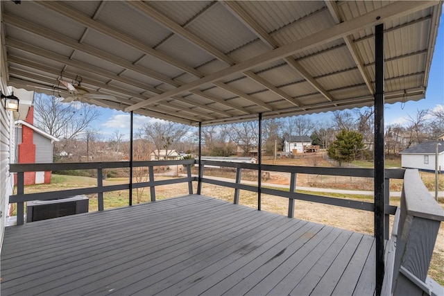 wooden deck featuring central AC unit