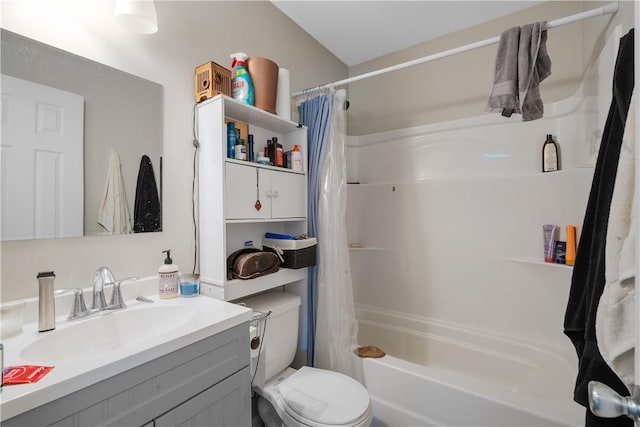 full bathroom featuring vanity, shower / bathtub combination with curtain, and toilet