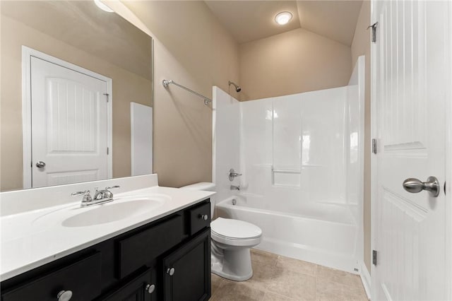 full bathroom featuring tile patterned floors, toilet, vaulted ceiling, shower / bathing tub combination, and vanity