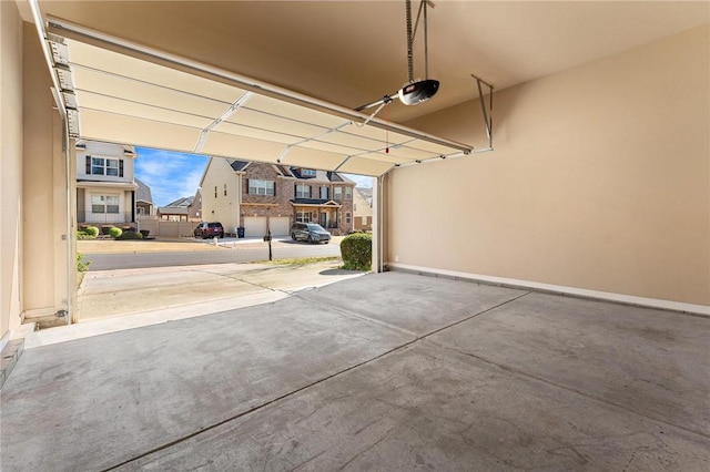 garage featuring a garage door opener