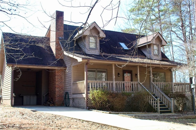 cape cod-style house with a porch