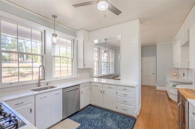 kitchen with white cabinetry and sink