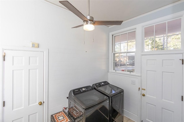 washroom featuring ceiling fan, washer and dryer, and a healthy amount of sunlight