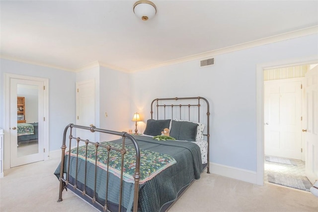 carpeted bedroom with crown molding