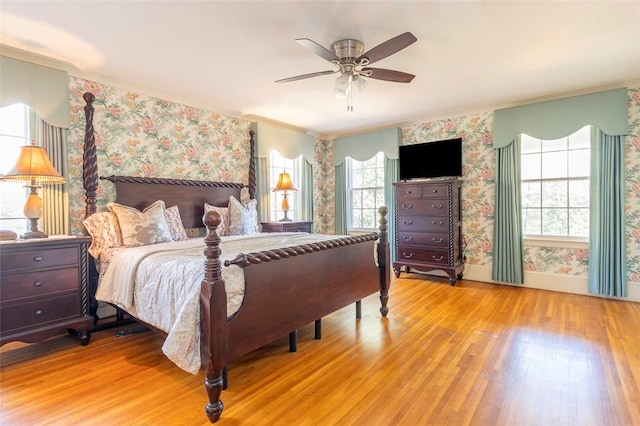 bedroom featuring ceiling fan and light wood-type flooring