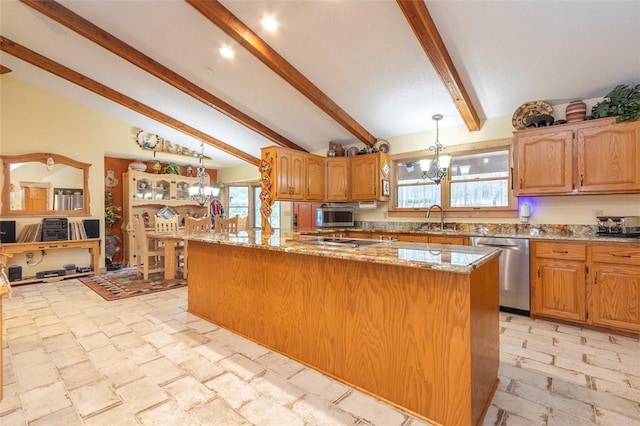 kitchen featuring sink, a chandelier, hanging light fixtures, dishwasher, and a kitchen island