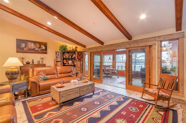 living room featuring vaulted ceiling with beams and french doors