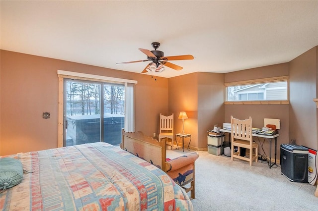 bedroom featuring light carpet, access to outside, and ceiling fan