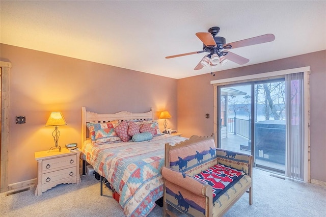 carpeted bedroom with access to exterior and ceiling fan