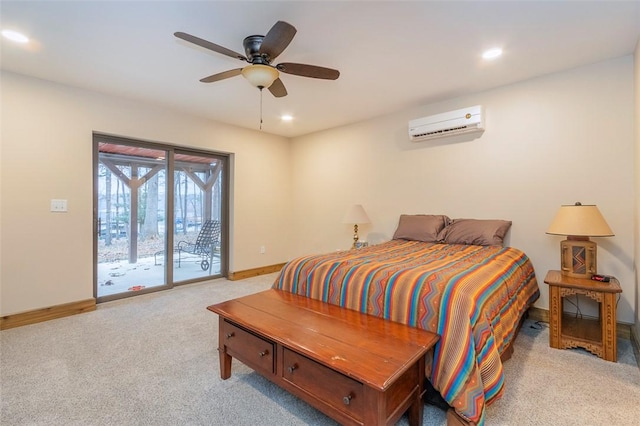 carpeted bedroom featuring a wall mounted air conditioner, access to outside, and ceiling fan