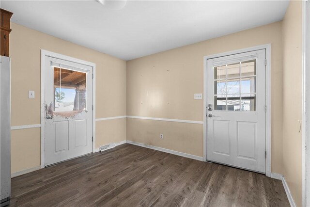 foyer featuring dark hardwood / wood-style flooring