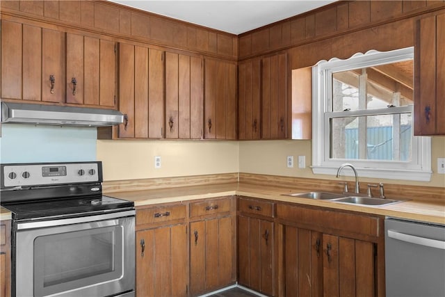 kitchen featuring stainless steel appliances and sink