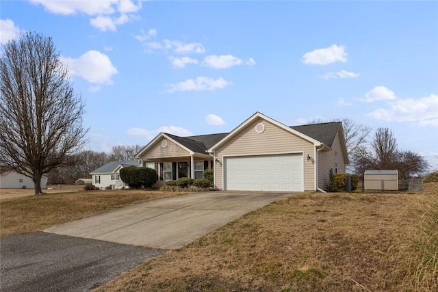 single story home featuring a garage and a front yard