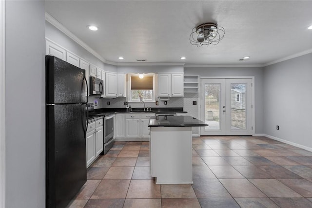 kitchen with a kitchen island, sink, white cabinets, black appliances, and crown molding