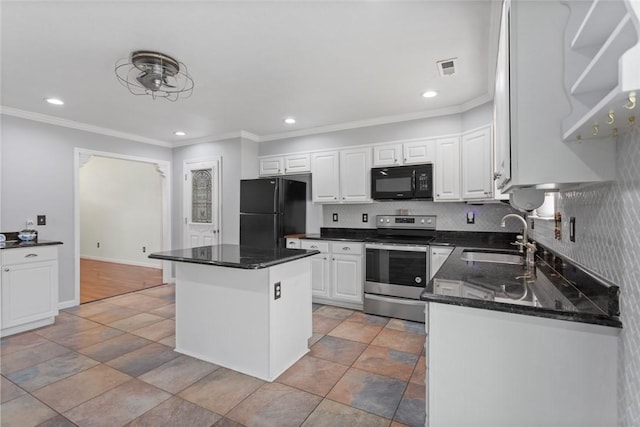 kitchen with tasteful backsplash, sink, dark stone countertops, white cabinets, and black appliances