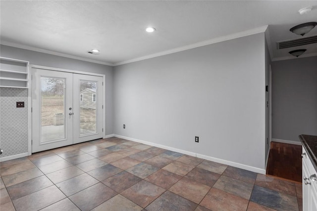 unfurnished room with french doors and crown molding