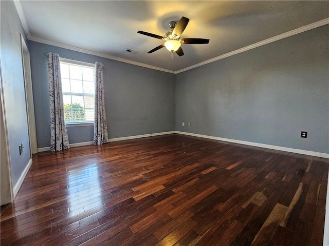 unfurnished room with dark hardwood / wood-style flooring, ornamental molding, and ceiling fan