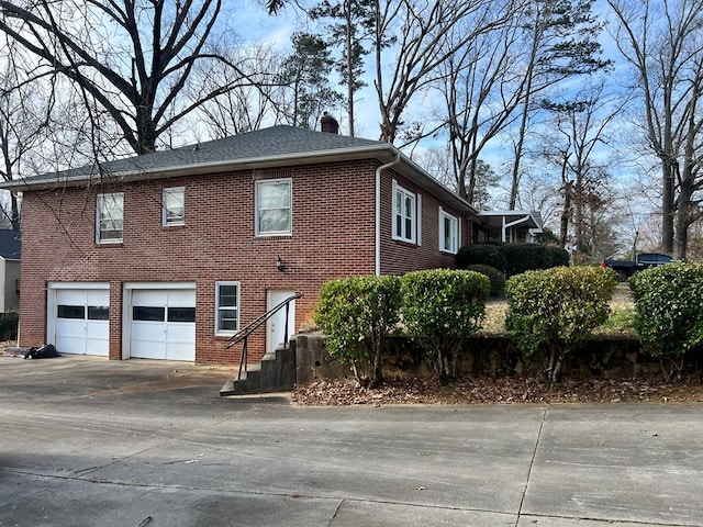 view of property exterior featuring a garage