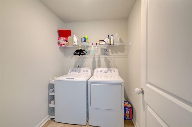 laundry room with washing machine and dryer