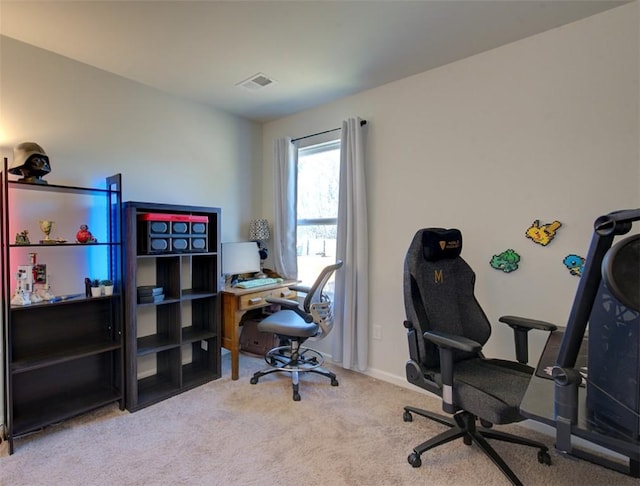 office area featuring light colored carpet