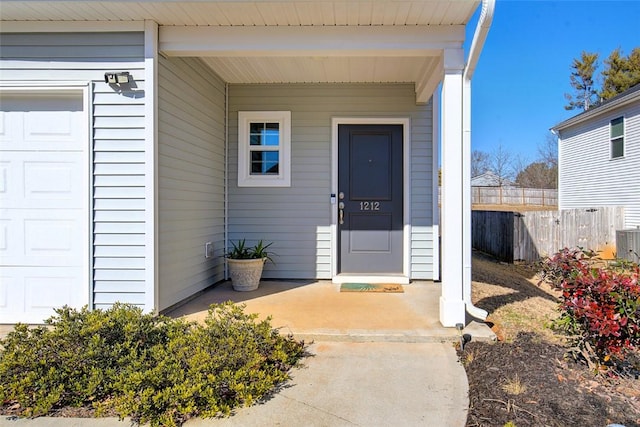 doorway to property featuring a garage