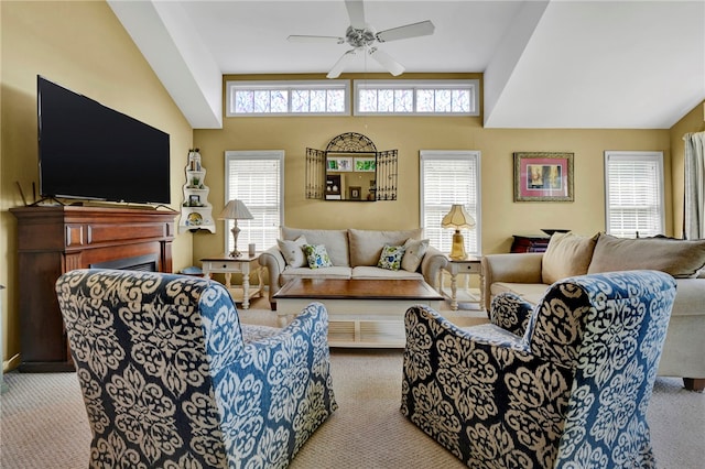 carpeted living room with plenty of natural light and ceiling fan