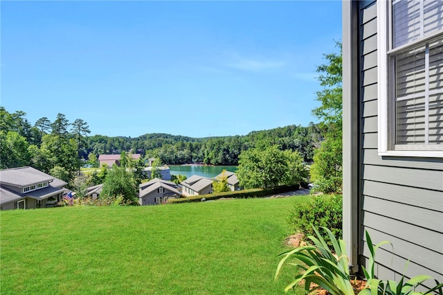 view of yard with a water view