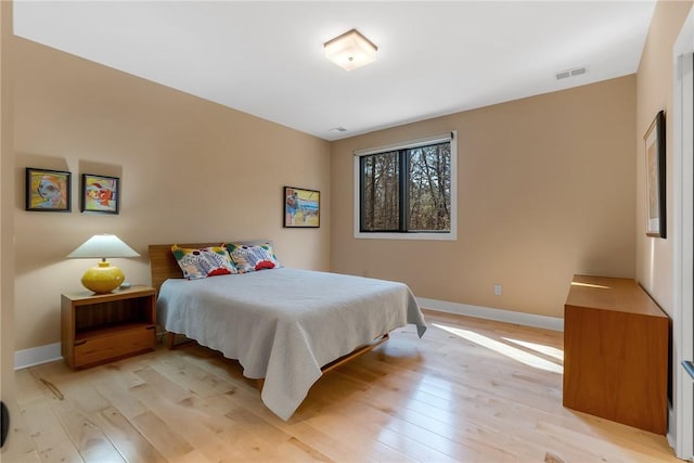 bedroom featuring light hardwood / wood-style floors