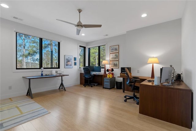 office area featuring ceiling fan and light wood-type flooring