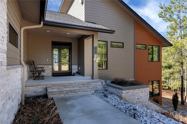 entrance to property featuring french doors