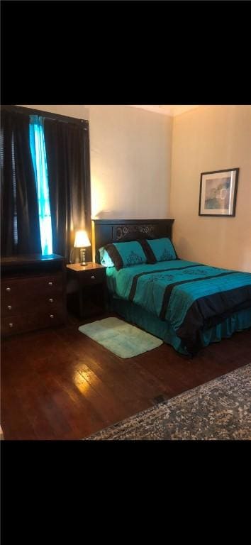 bedroom featuring hardwood / wood-style floors