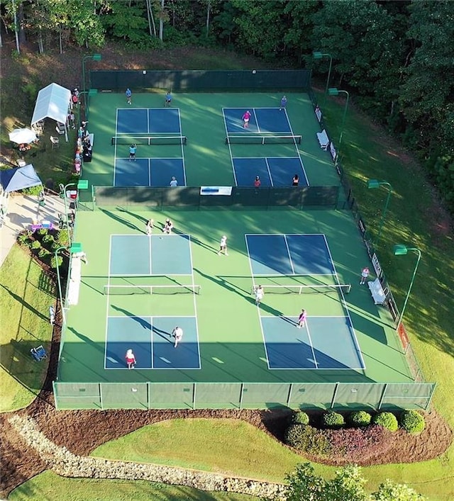 view of basketball court featuring tennis court