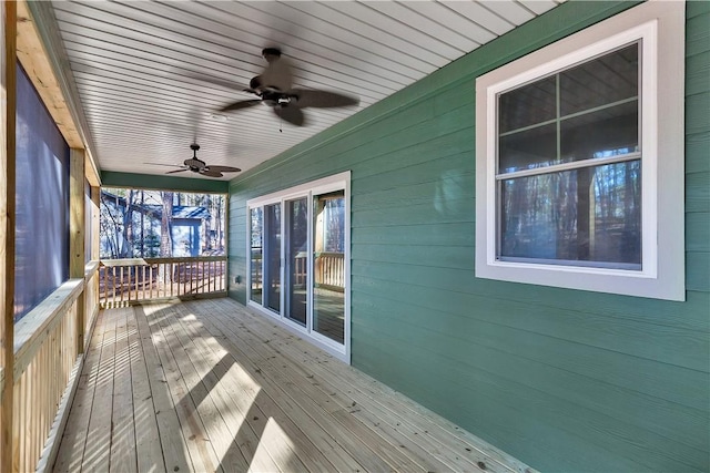 wooden deck with ceiling fan