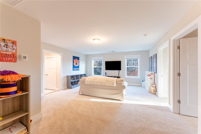 living room featuring light carpet