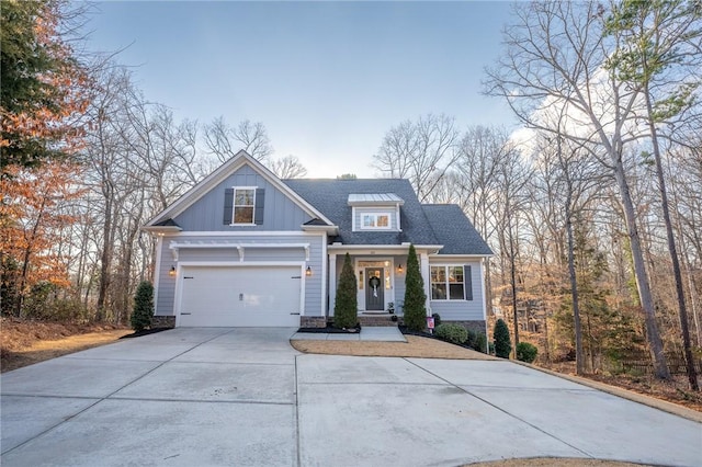 craftsman house with a garage