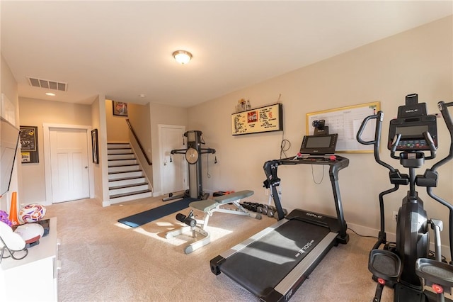 workout area with light colored carpet