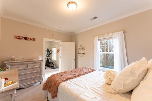 bedroom featuring crown molding and light colored carpet