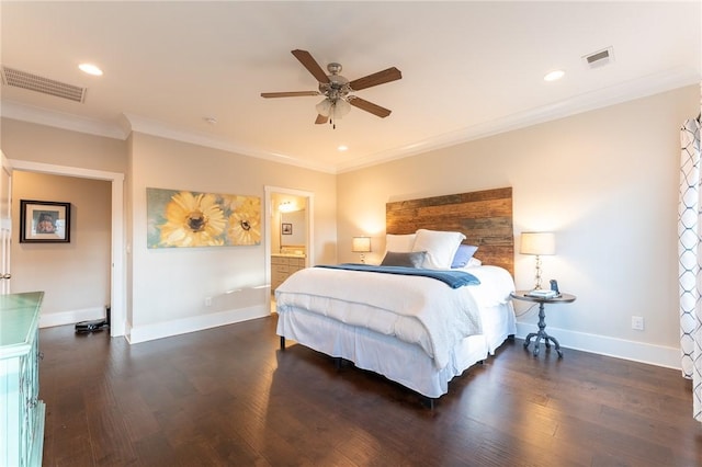 bedroom with crown molding, ensuite bath, dark hardwood / wood-style floors, and ceiling fan