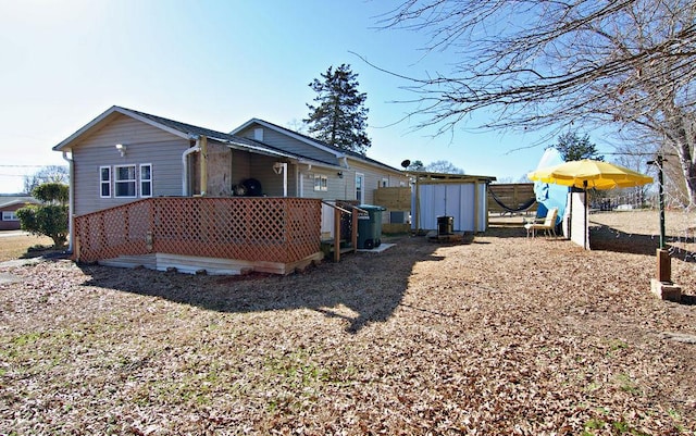 view of front of home with a storage unit