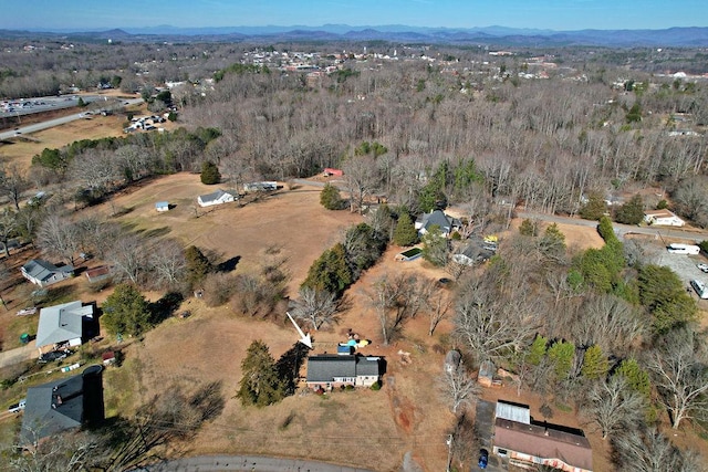 drone / aerial view featuring a mountain view