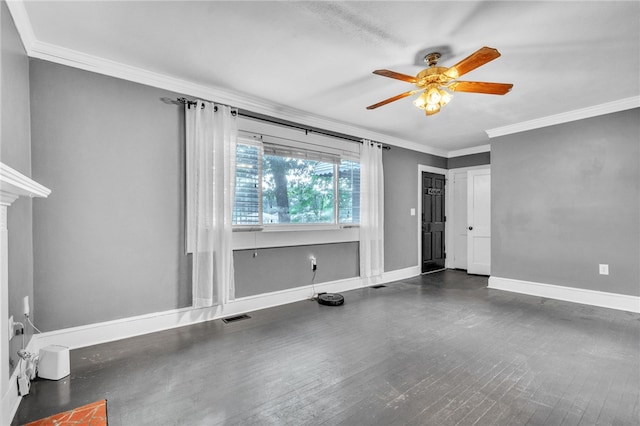 spare room featuring ornamental molding, dark hardwood / wood-style floors, and ceiling fan