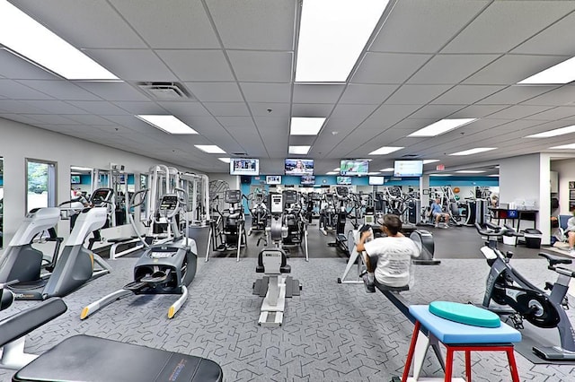 workout area featuring a drop ceiling