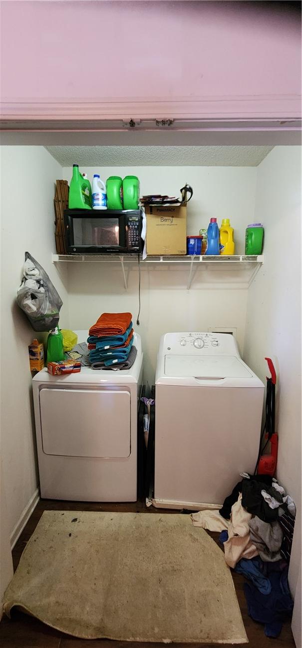 laundry area with washer and dryer