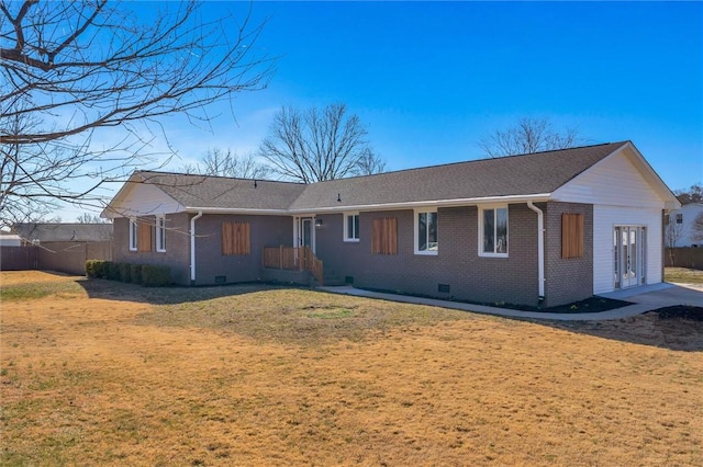 ranch-style house featuring a front lawn