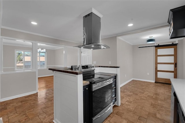 kitchen featuring stainless steel electric range, island range hood, ornamental molding, and a barn door